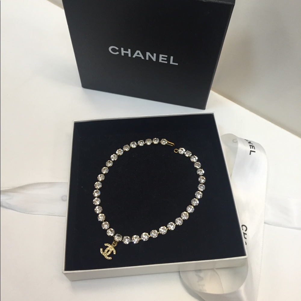 Vintage Chanel rhinestone necklace with logo charm